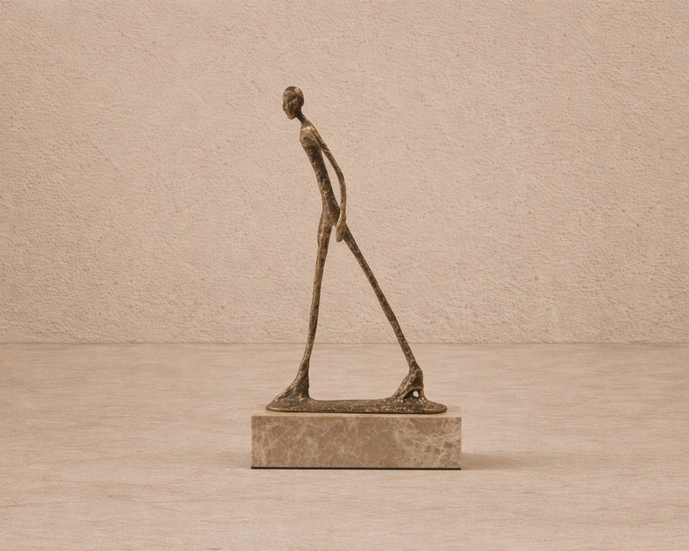 Stride Sculpture - Gold Bronze