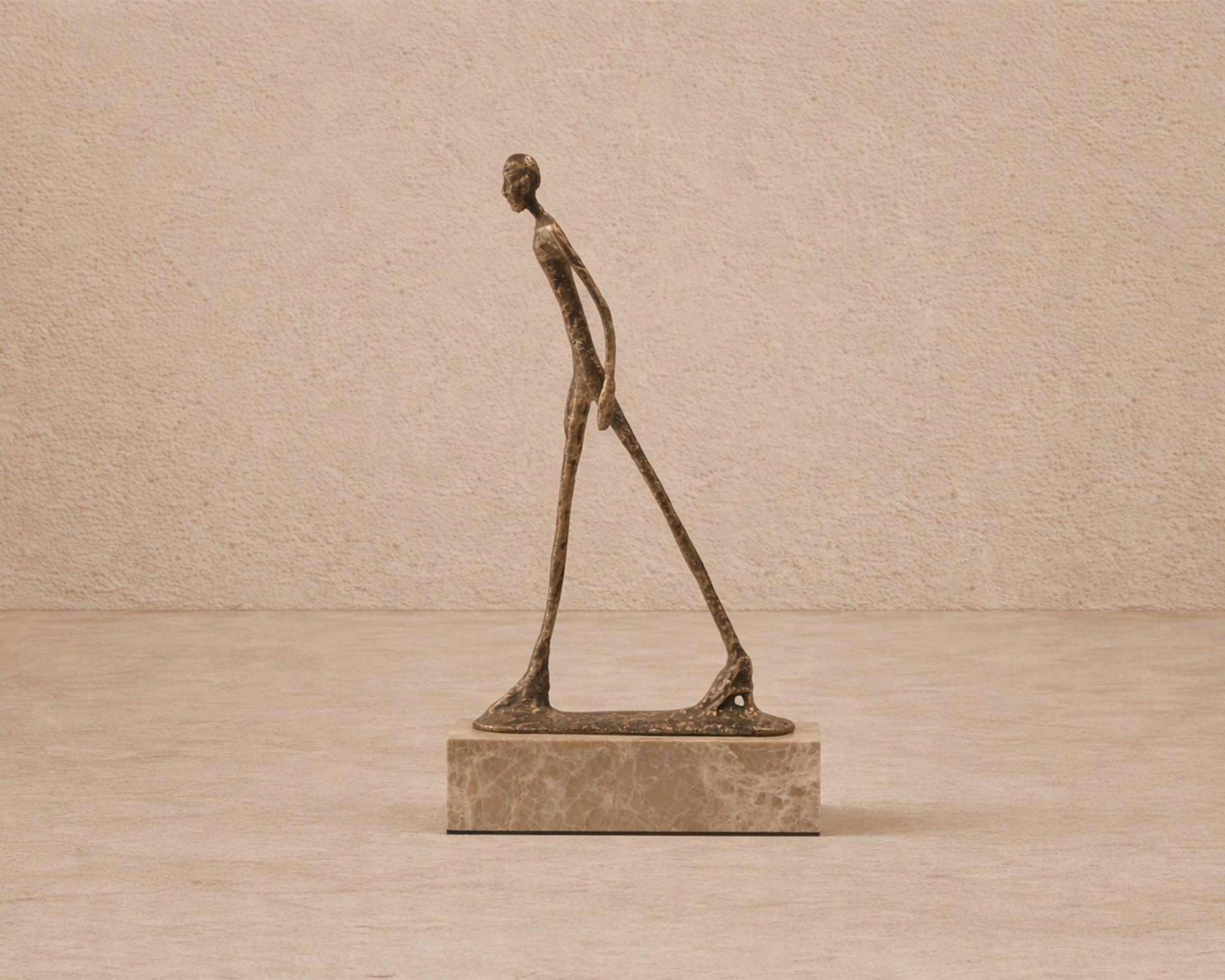Stride Sculpture - Gold Bronze